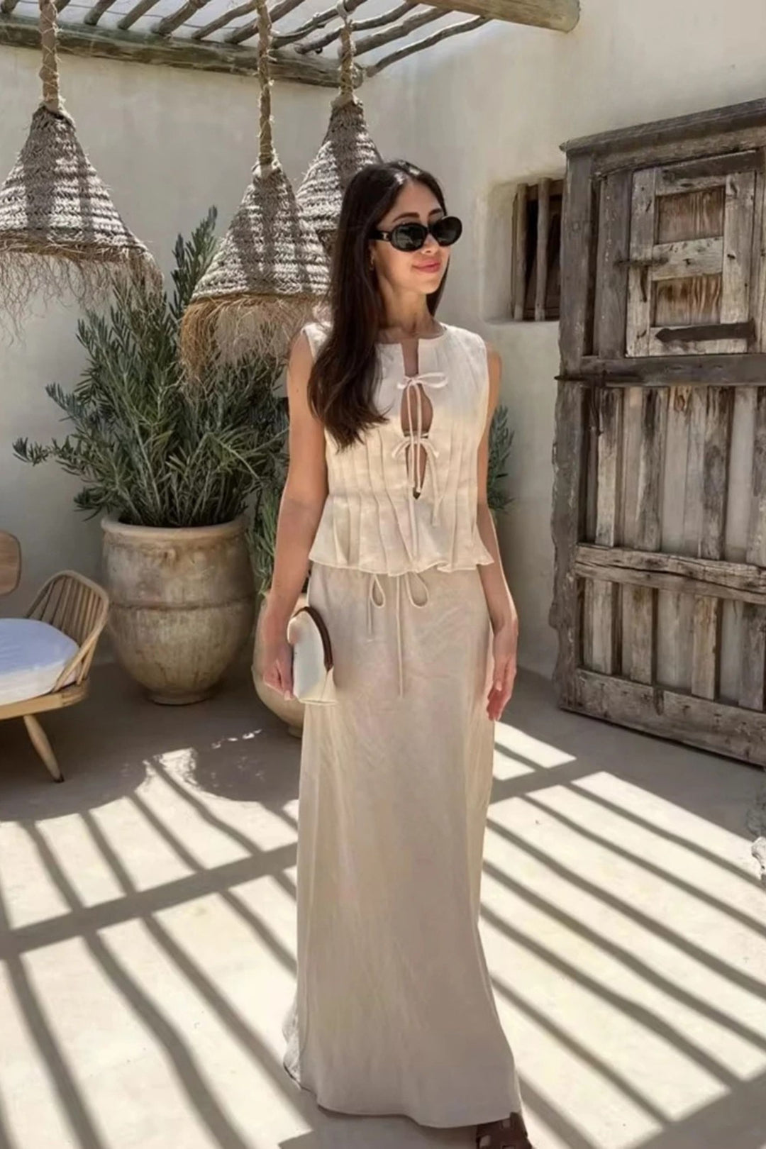 Mouwloze Plissé Top met Striksluiting en Midi Rok - Co ord set