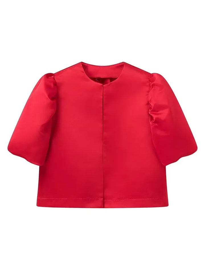 Elegante satijnen top met pofmouwen