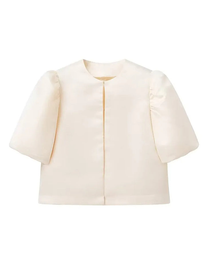 Elegante satijnen top met pofmouwen